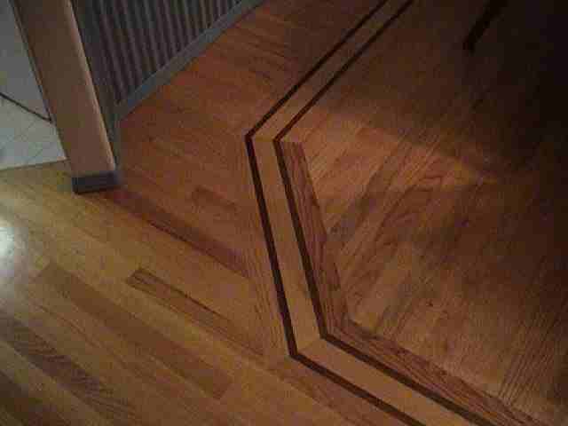 Photo of hardwood detail showing how the board ends meet.