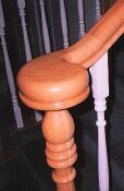 Photo of the top of a newel post.