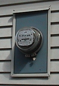 Photo of the electric meter and the trim around it.