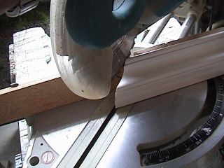 Photo of a miter saw showing an outside cut.